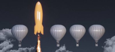 Orange colored rocket rising on the top between the hot air balloons. ( 3d render )